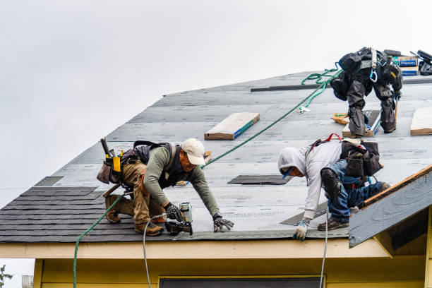 Professional Roofing technician working in Etna Green, IN